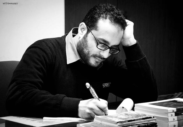 Portrait of author Hossam Mustafa Ibrahim